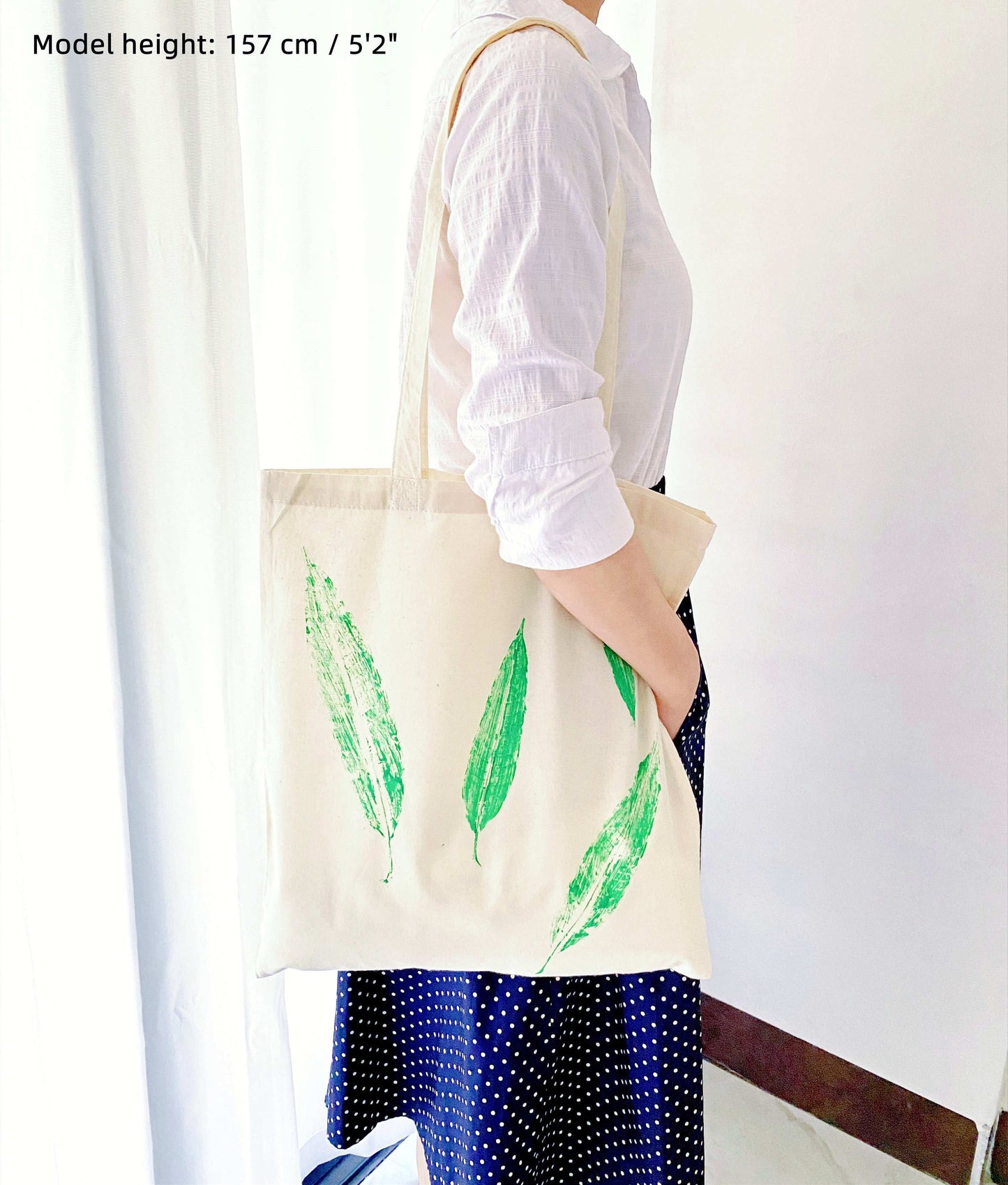 Soft lightweight shoulder bag with artistic leaf motif