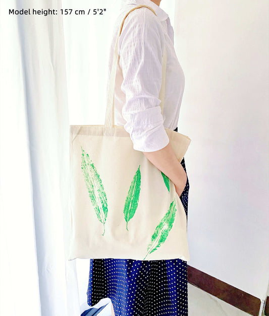 Soft lightweight shoulder bag with artistic leaf motif