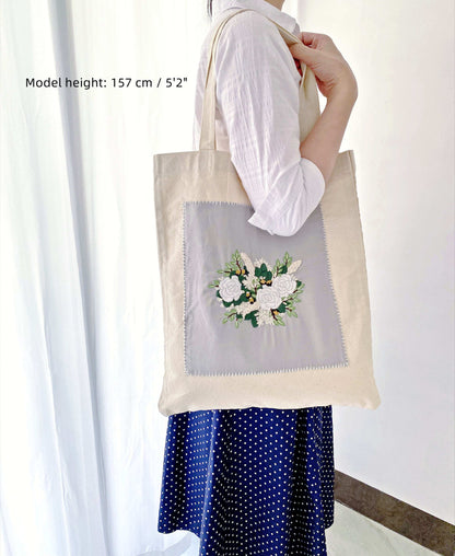 Large shoulder bag with hand-stitched flowers for creative lifestyles