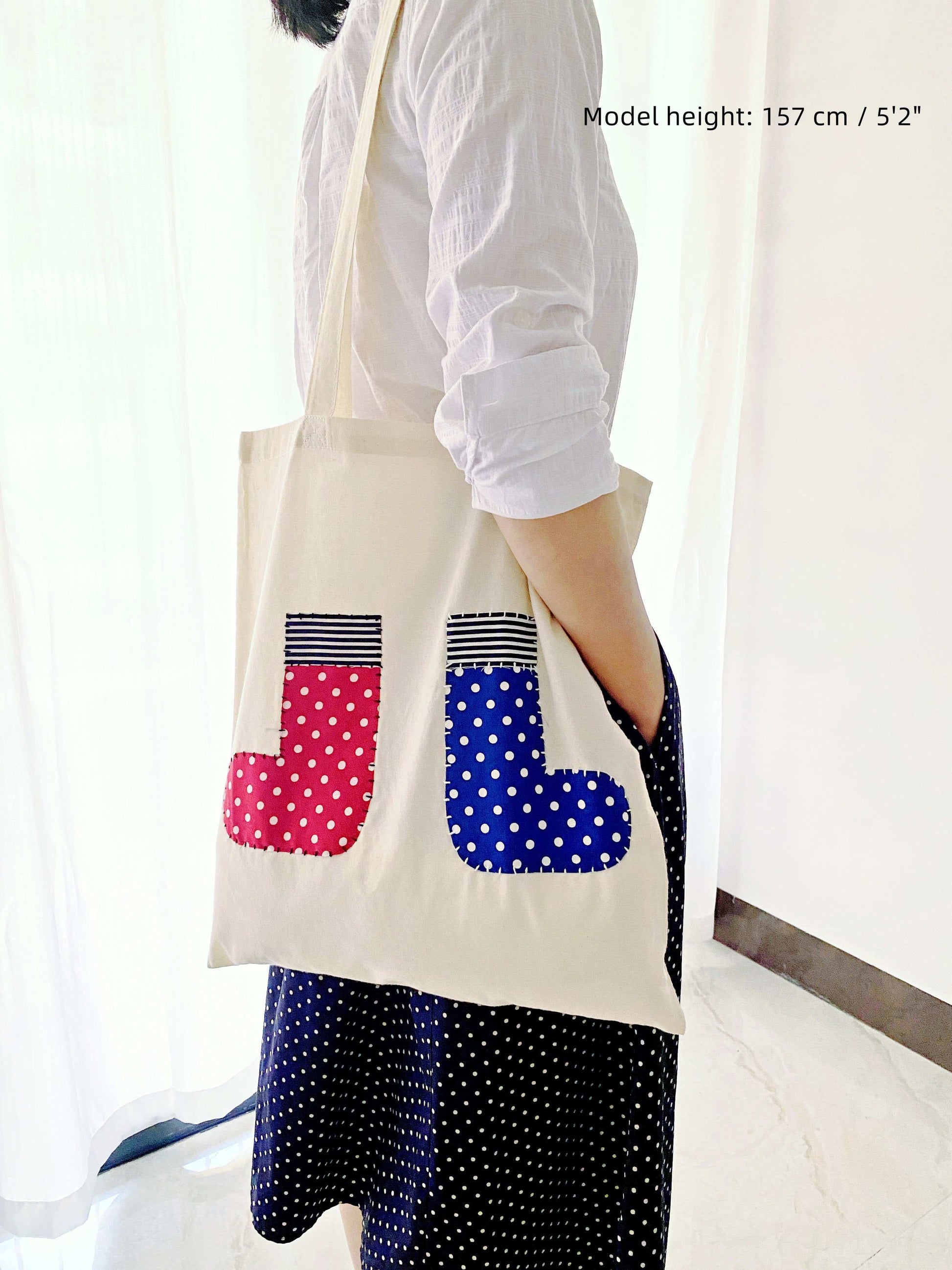 Comfortable lightweight tote bag with hand-stitched accents