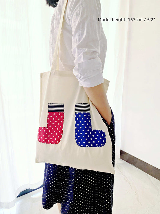 Comfortable lightweight tote bag with hand-stitched accents