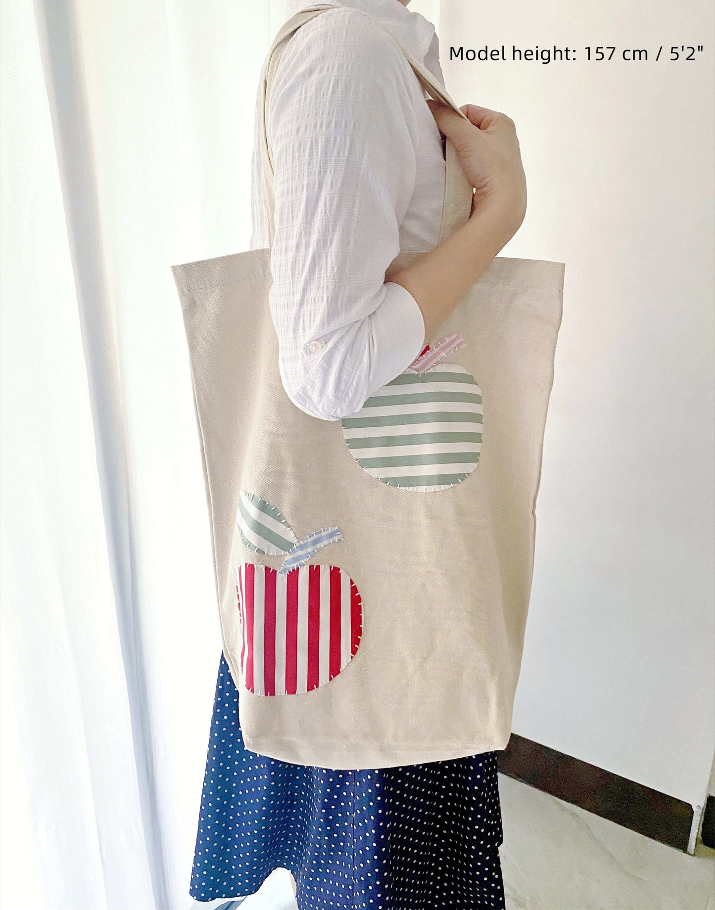 Durable cotton shoulder bag featuring artisanal stitched designs for those loving understated elegance