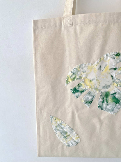 Green botanical patch stitched tote