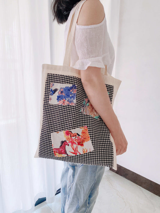 Minimalist canvas tote with hand-sewn pattern