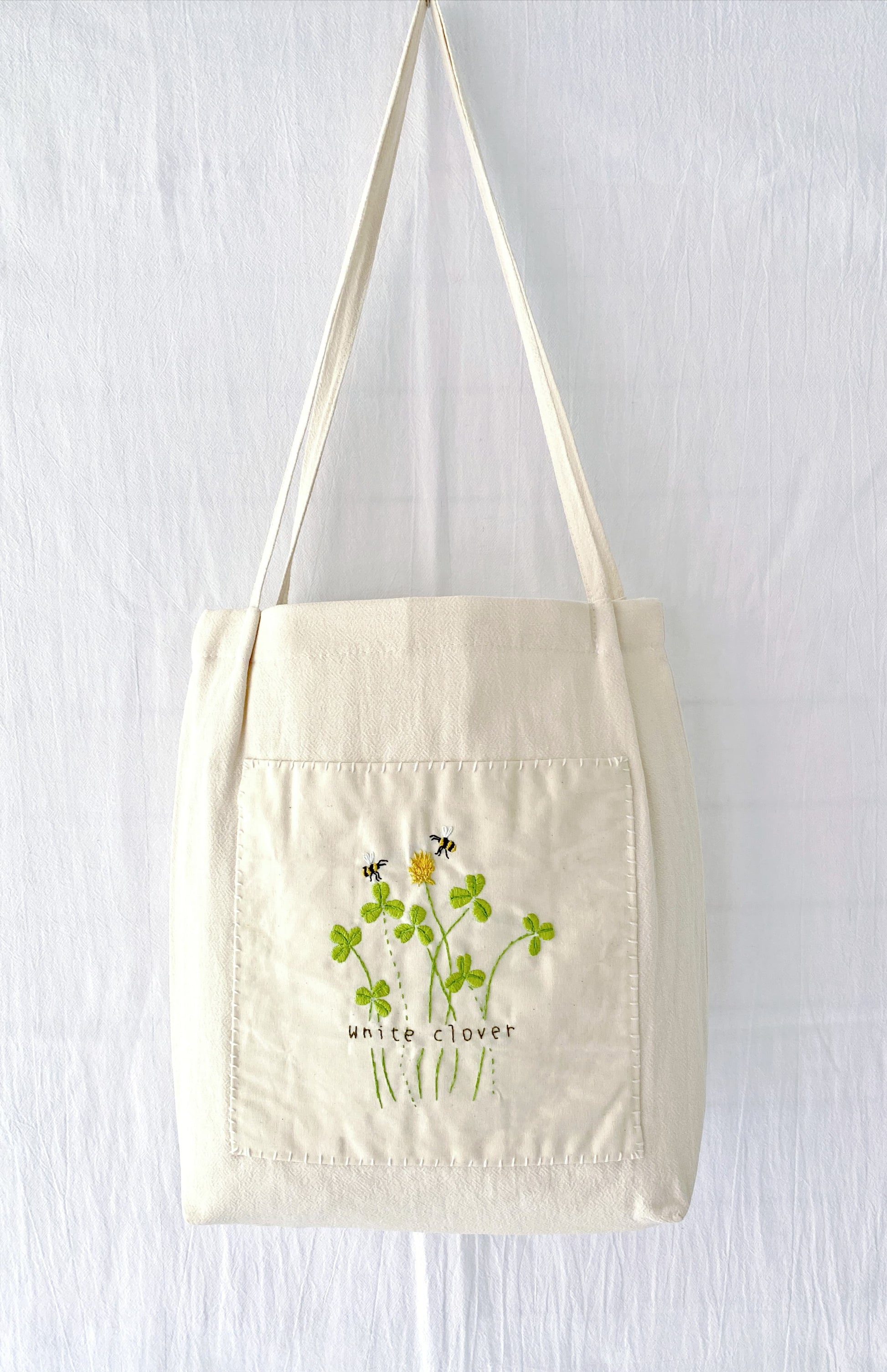 hand-stitched floral tote for casual chic outfits