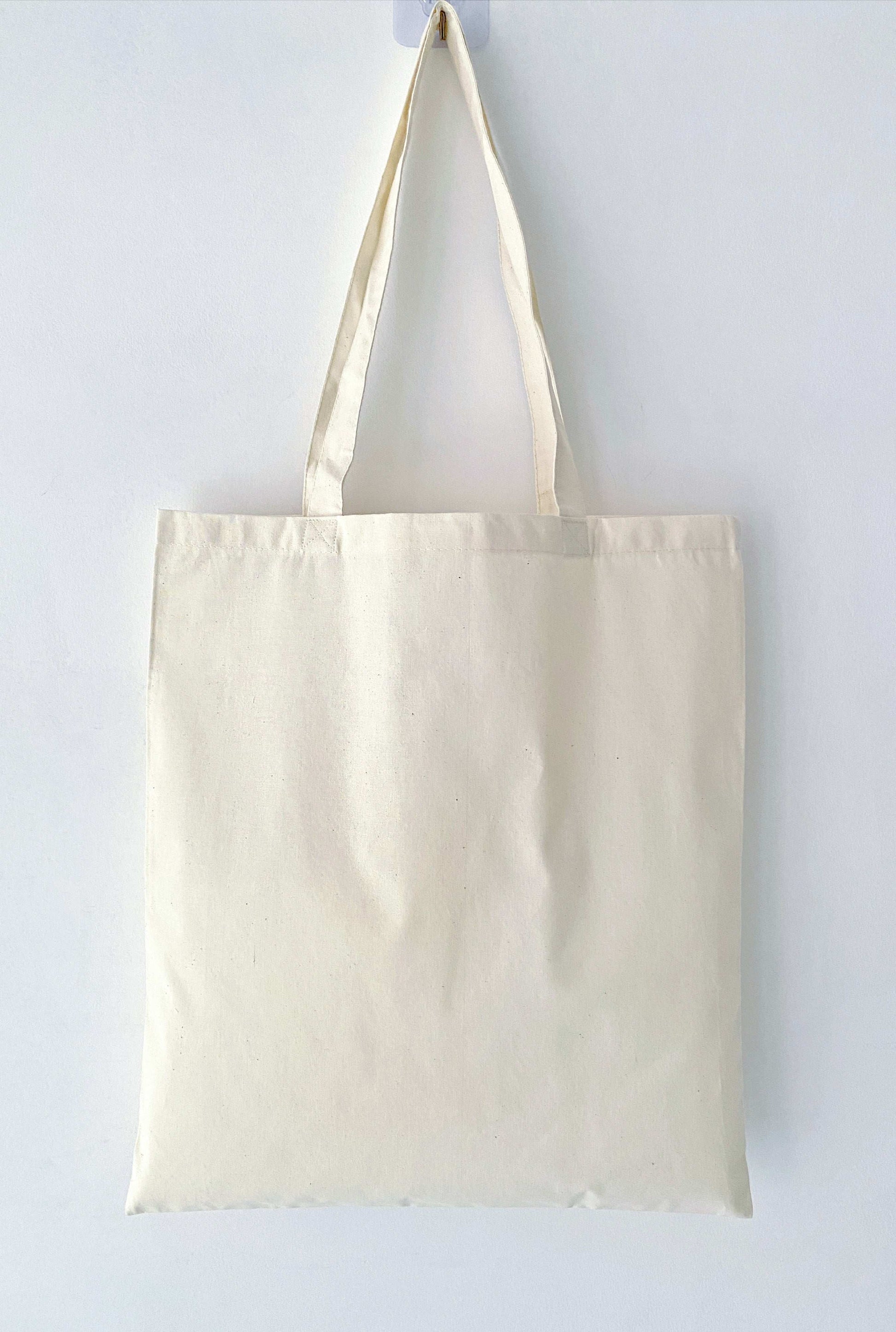 Soft lightweight cotton shoulder bag for a relaxed and effortless style.