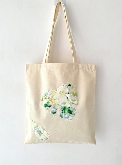 Natural cotton tote with green leaf stitch