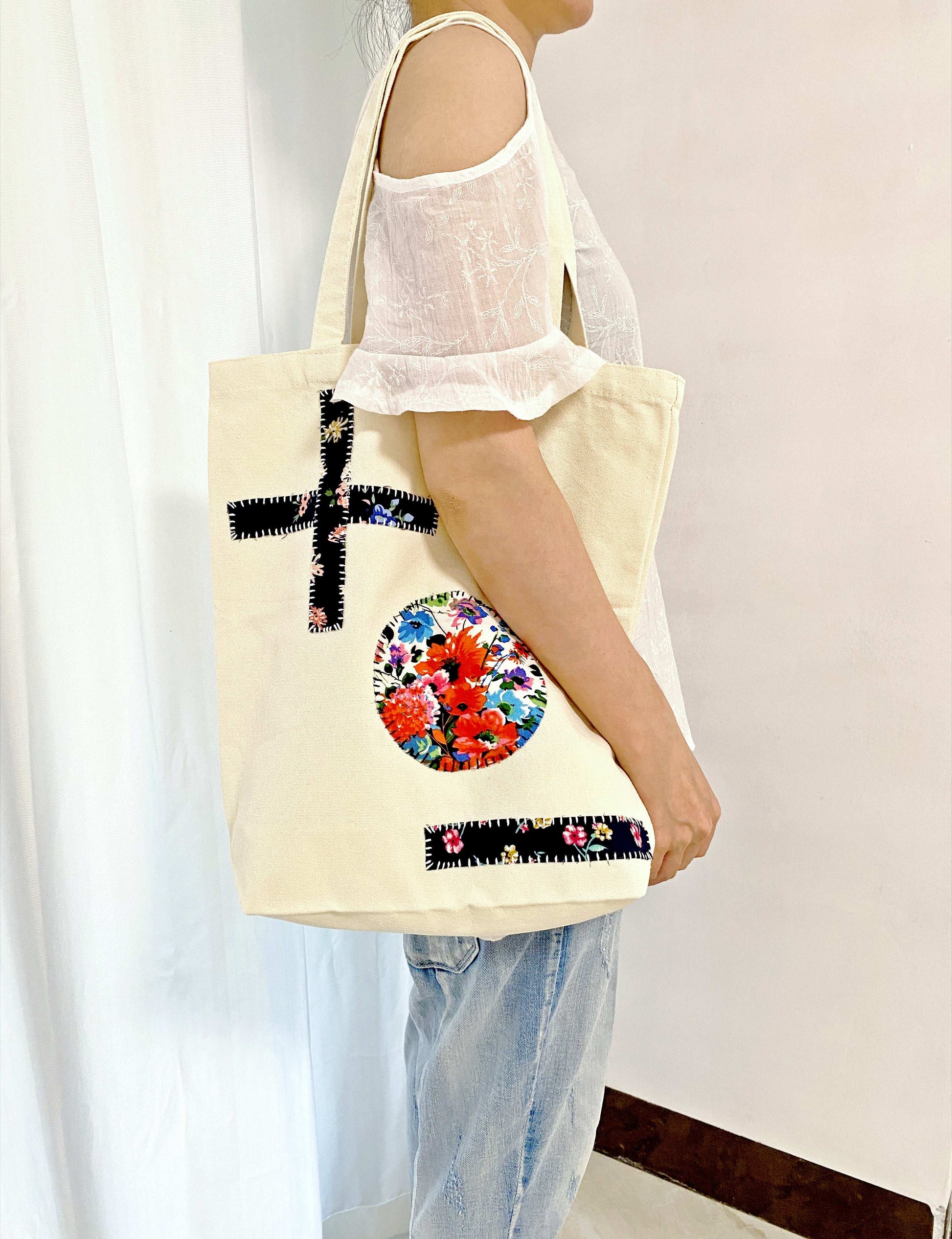 One-of-a-kind tote bag with stitched fabric