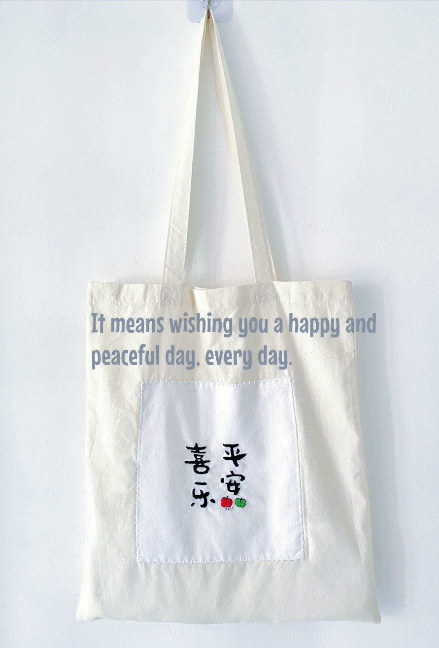 sustainable cotton tote with hand embroidered creative designs
