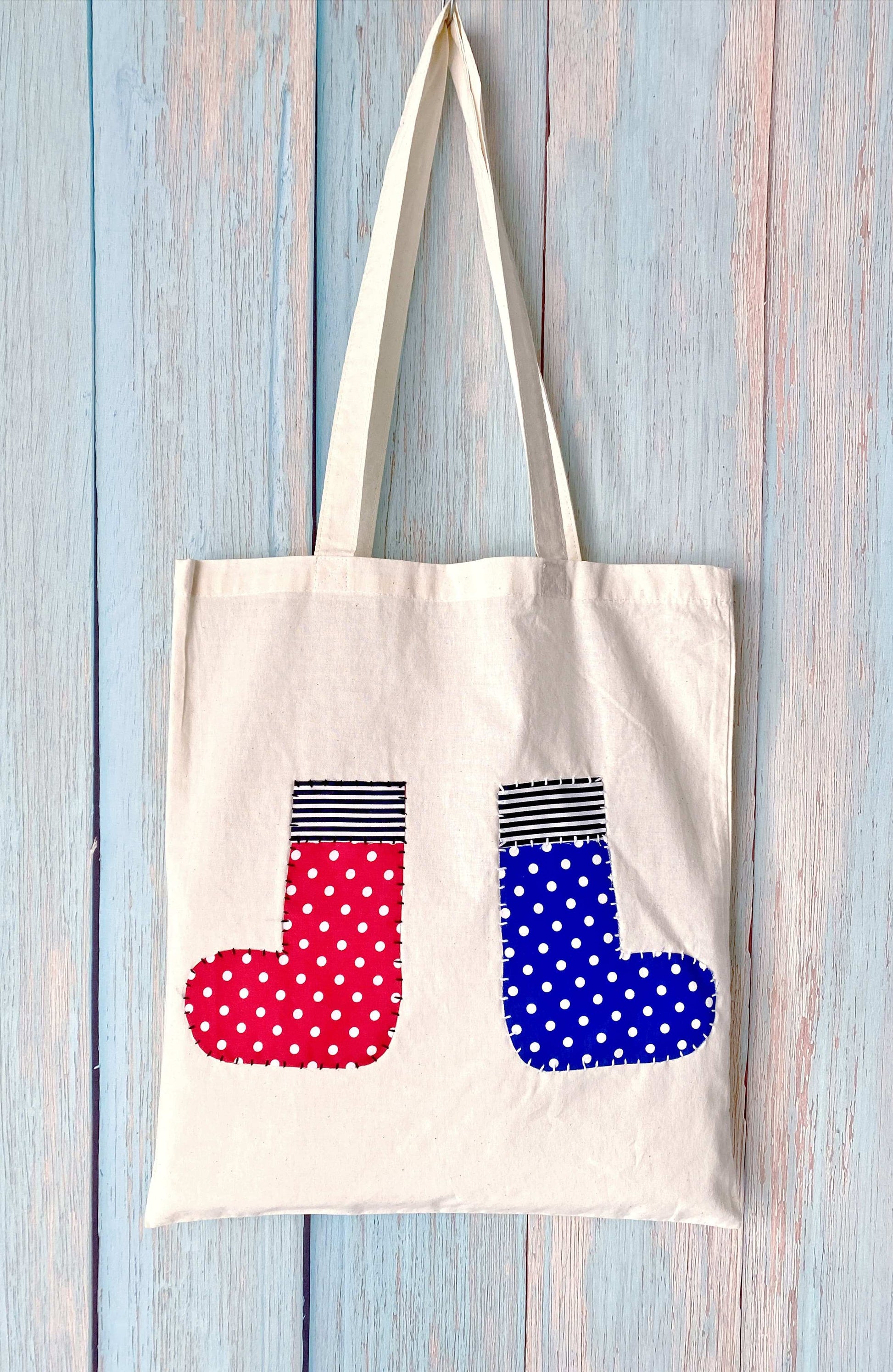 Sustainable fabric tote with artistic stitched patch design for women