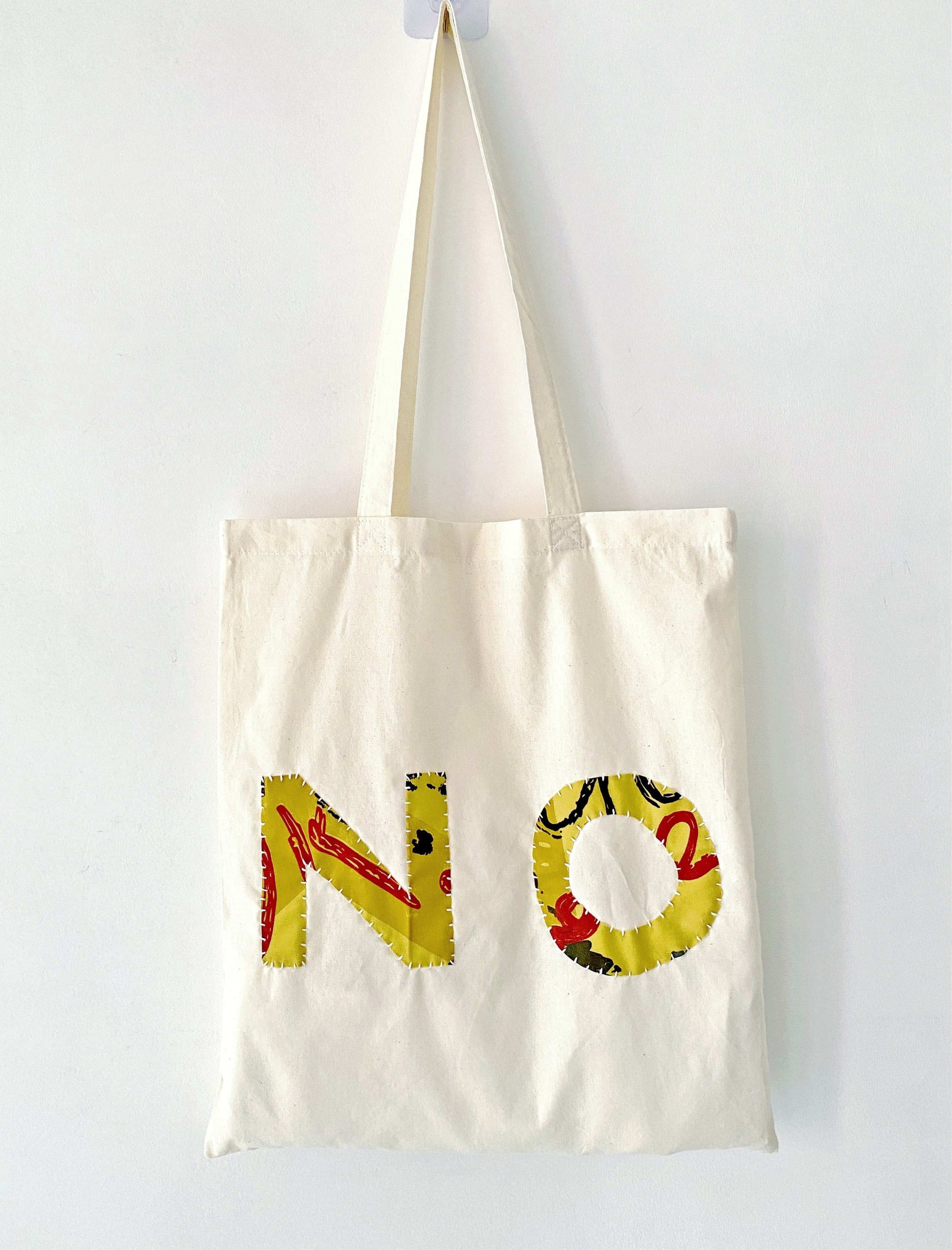 Durable women's bag featuring artistic patchwork, perfect for slow living and unique gifts