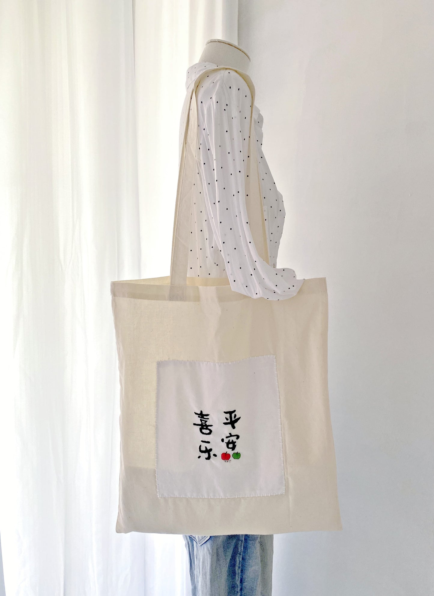 eco friendly tote bag with soft texture and minimalist embroidery