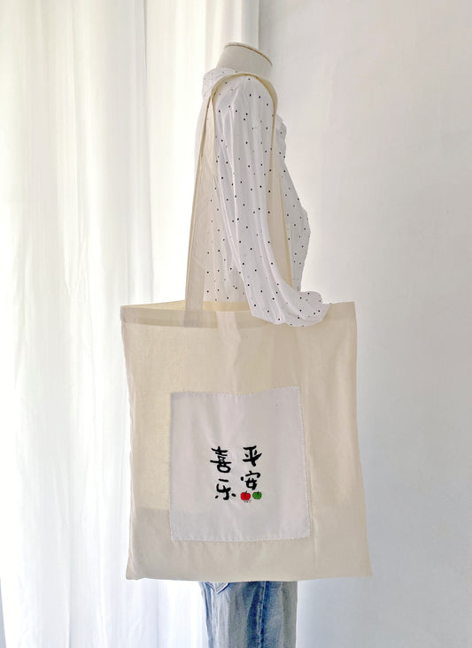 eco friendly tote bag with soft texture and minimalist embroidery