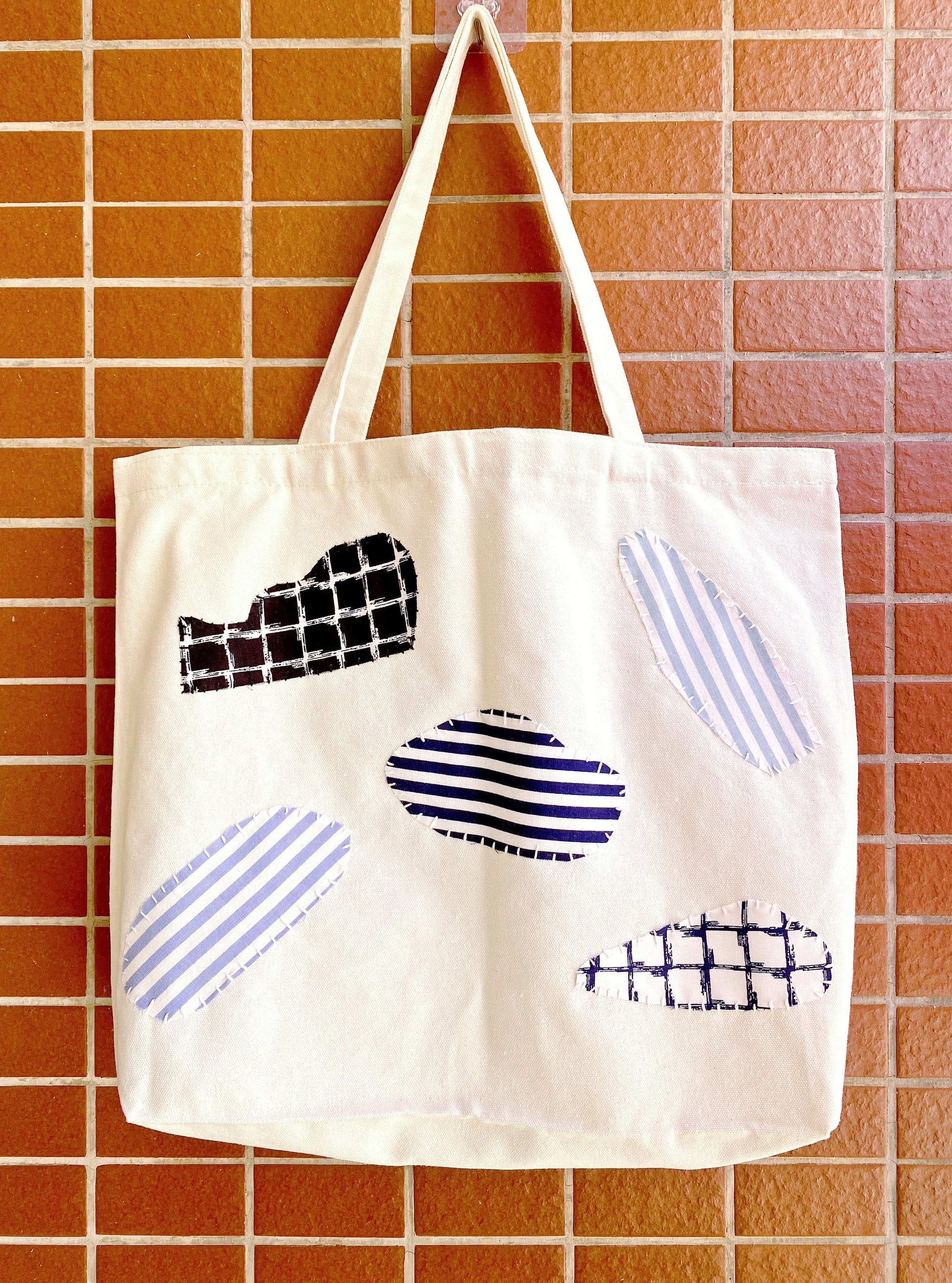 Minimalist cotton canvas shoulder tote with durable handmade stitching