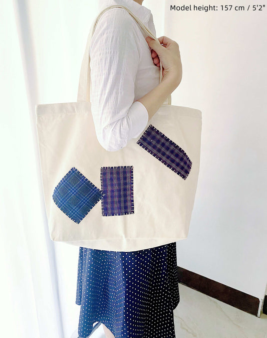 durable canvas shoulder bag with artistic design