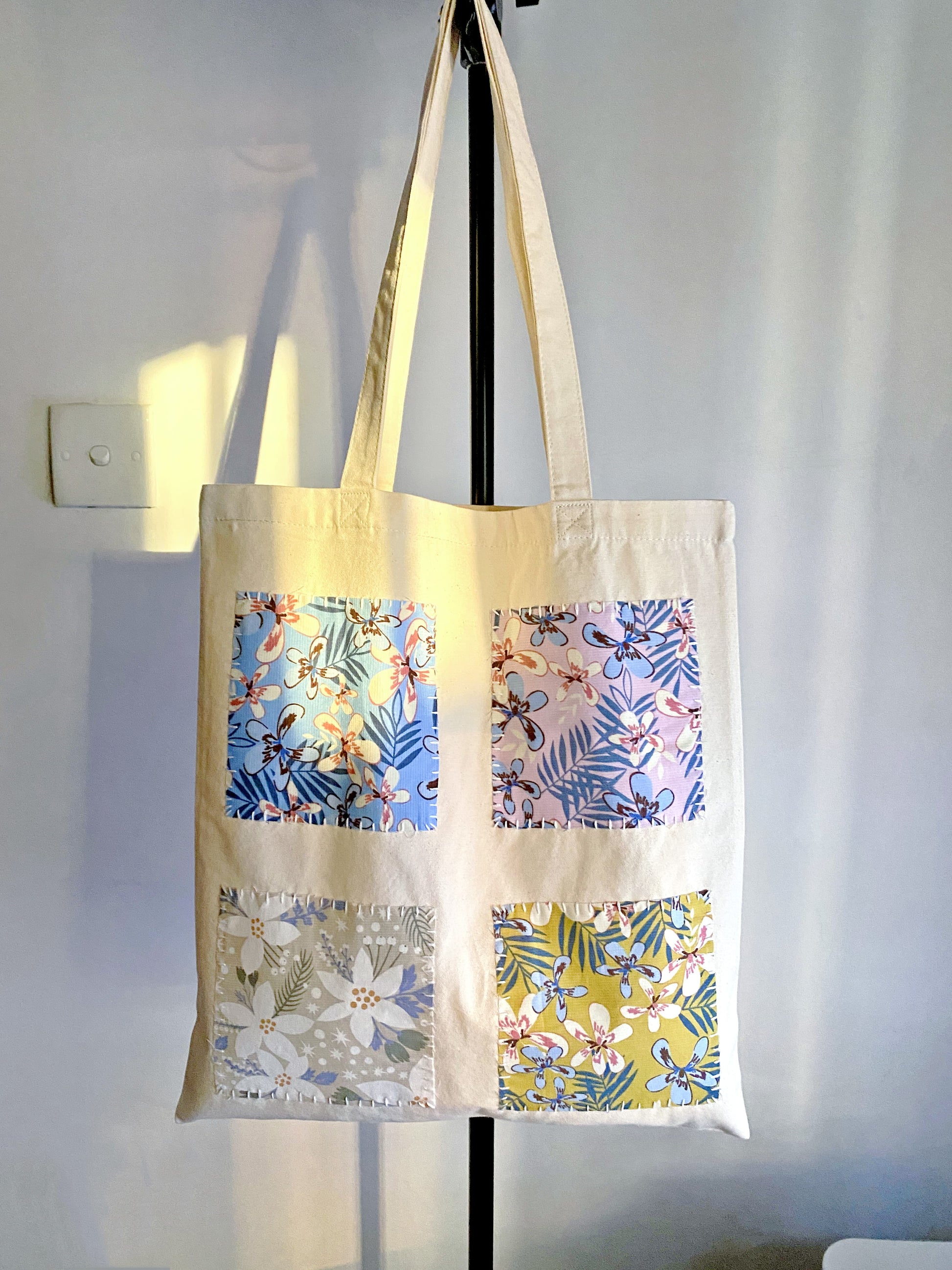 minimalist canvas shopper bag with diy patchwork decoration for gifting or daily use