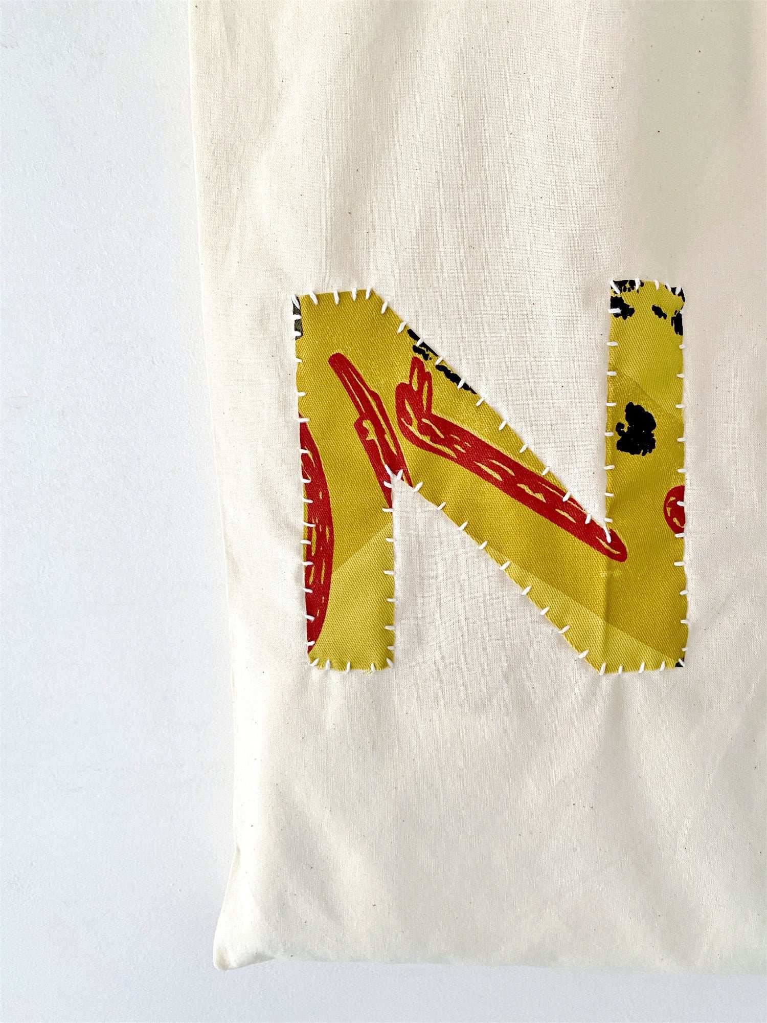 fabric tote with gentle handmade stitching detail for cozy charm