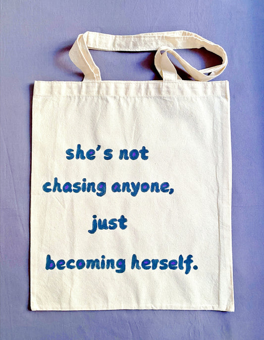 A soft and lightweight eco-friendly cotton tote bag with an inspirational English short phrase, perfect for daily use.