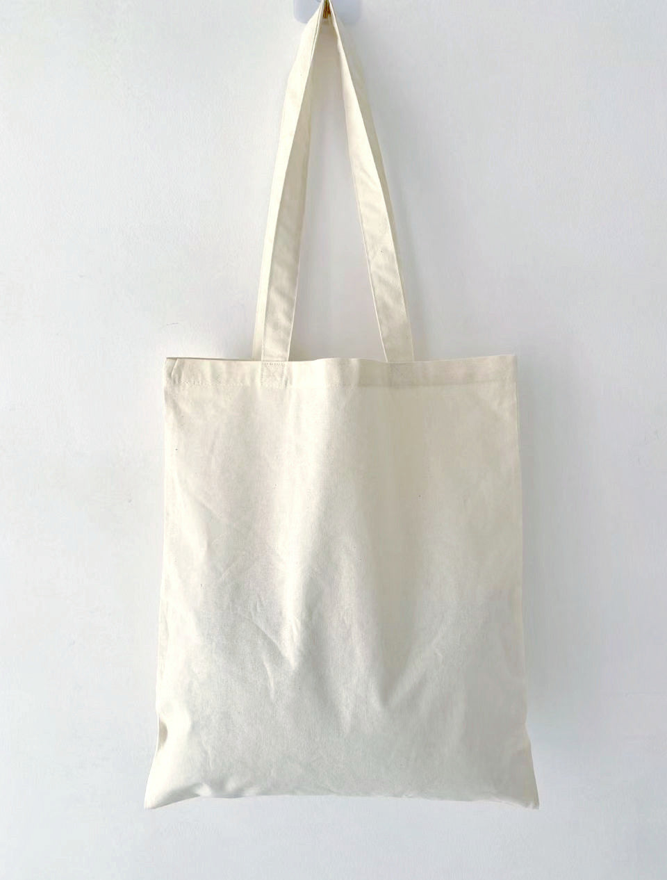 large eco-friendly tote bag with hand embroidered design