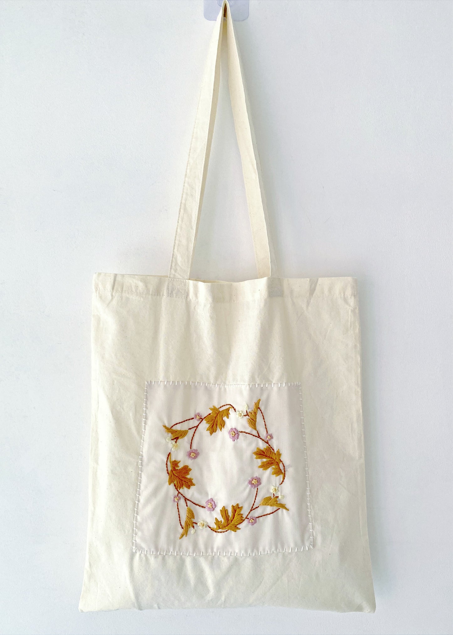 Eco cotton tote with hand-printed flower embroidery, ideal for Valentine’s or Mother’s Day gifts