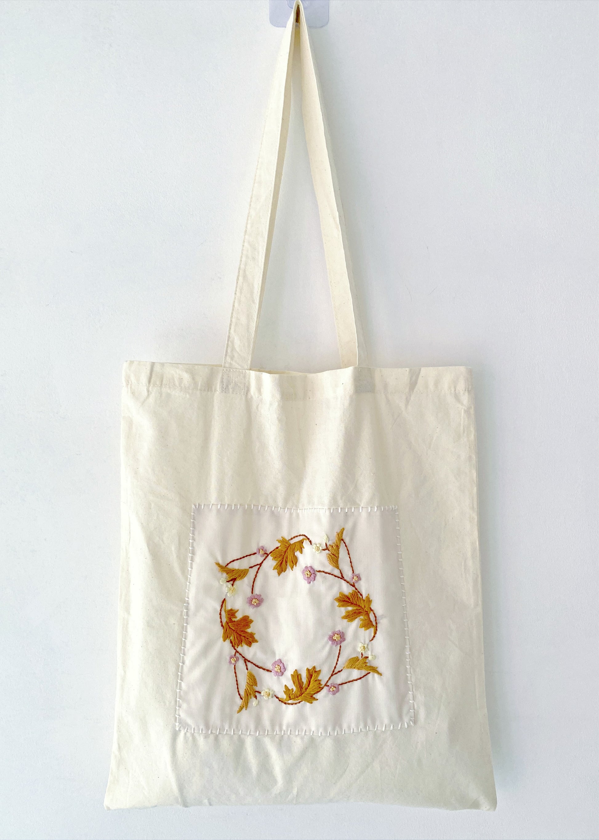 Eco cotton tote with hand-printed flower embroidery, ideal for Valentine’s or Mother’s Day gifts