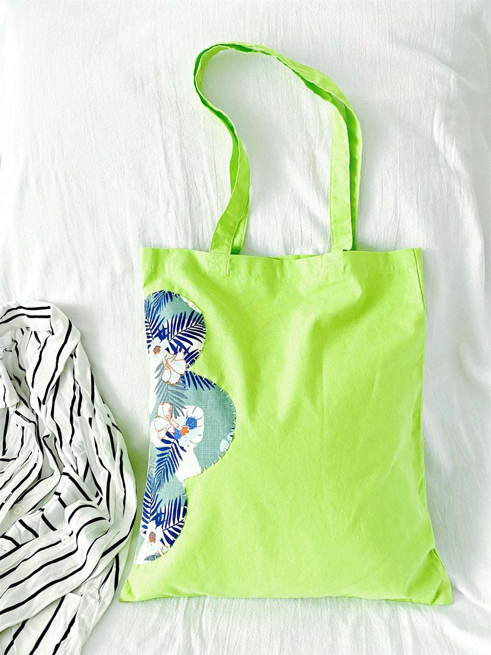Ultra-lightweight women's bag in natural materials, featuring artistic patchwork for daily use