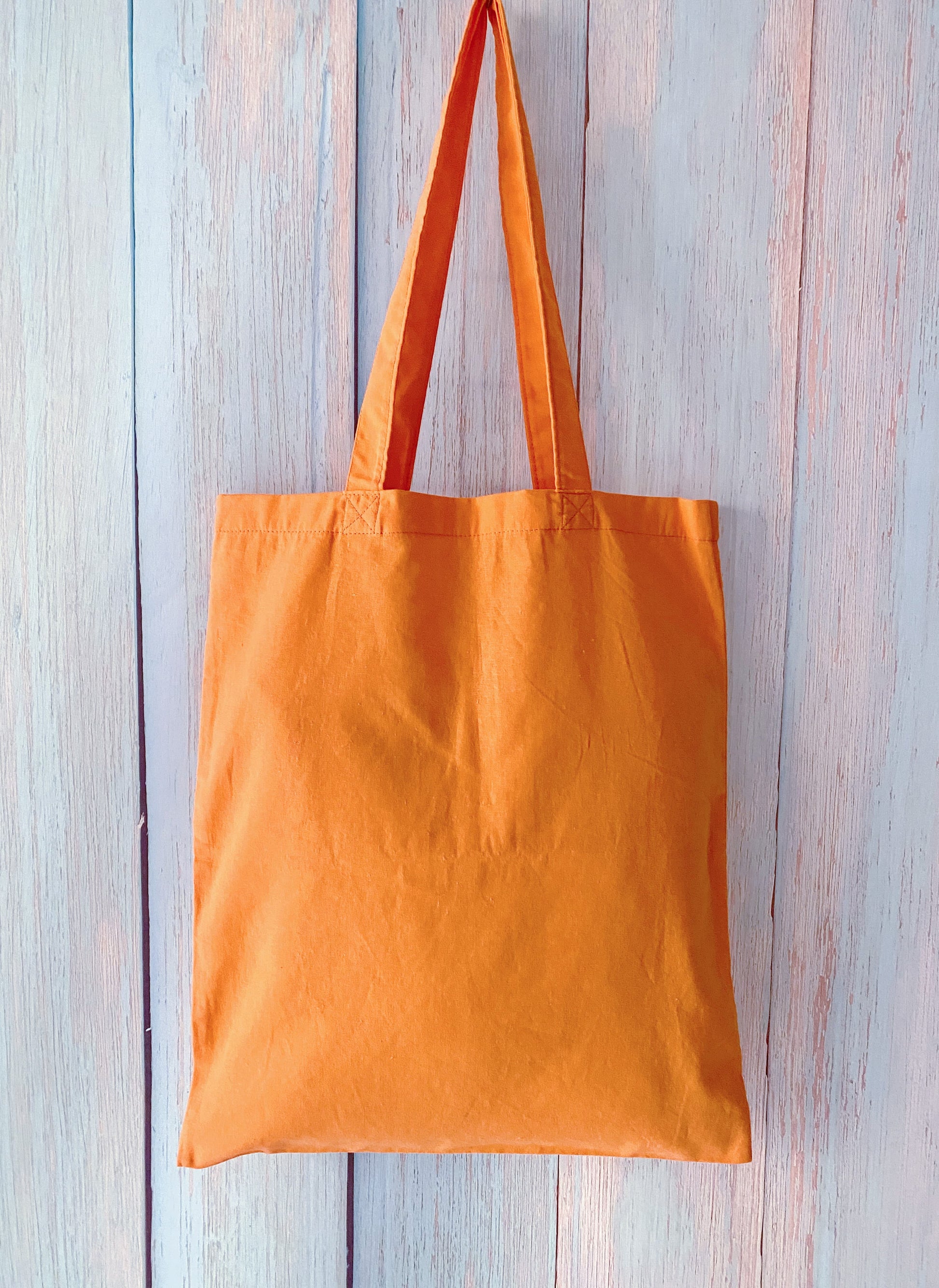 natural cotton shopping tote with handwritten-style English wording