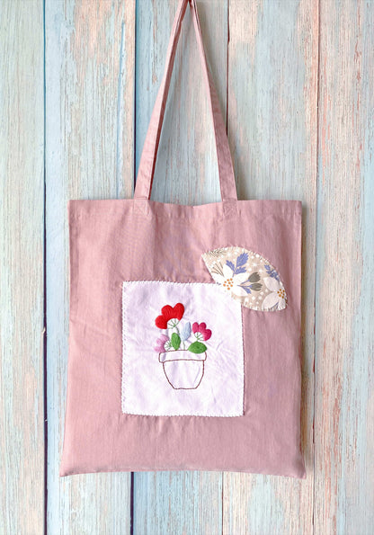 Large-capacity soft cotton tote bag with DIY-inspired floral embroidery, ideal for weekend outings and casual wear.