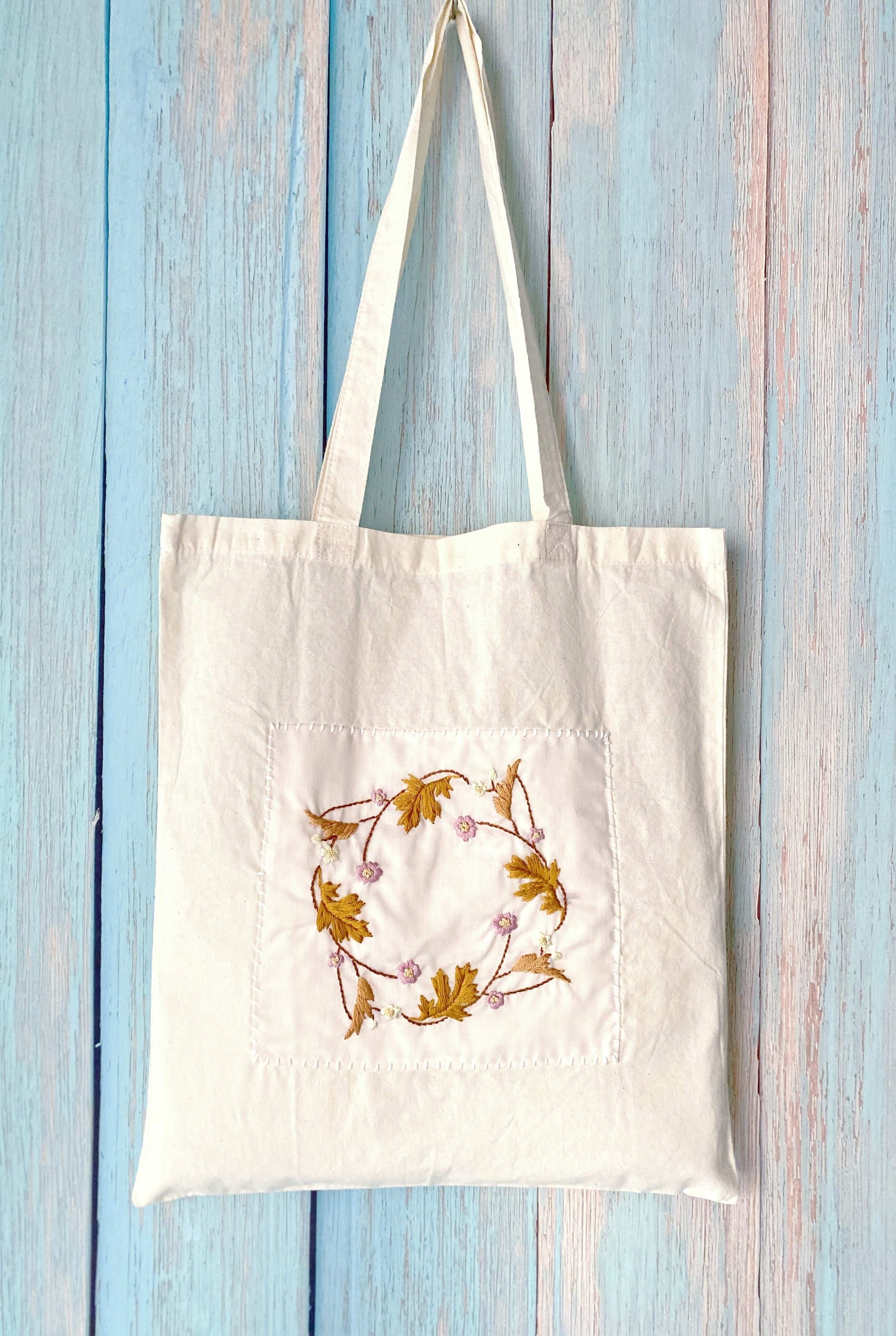 oversized lightweight tote with embroidered flowers