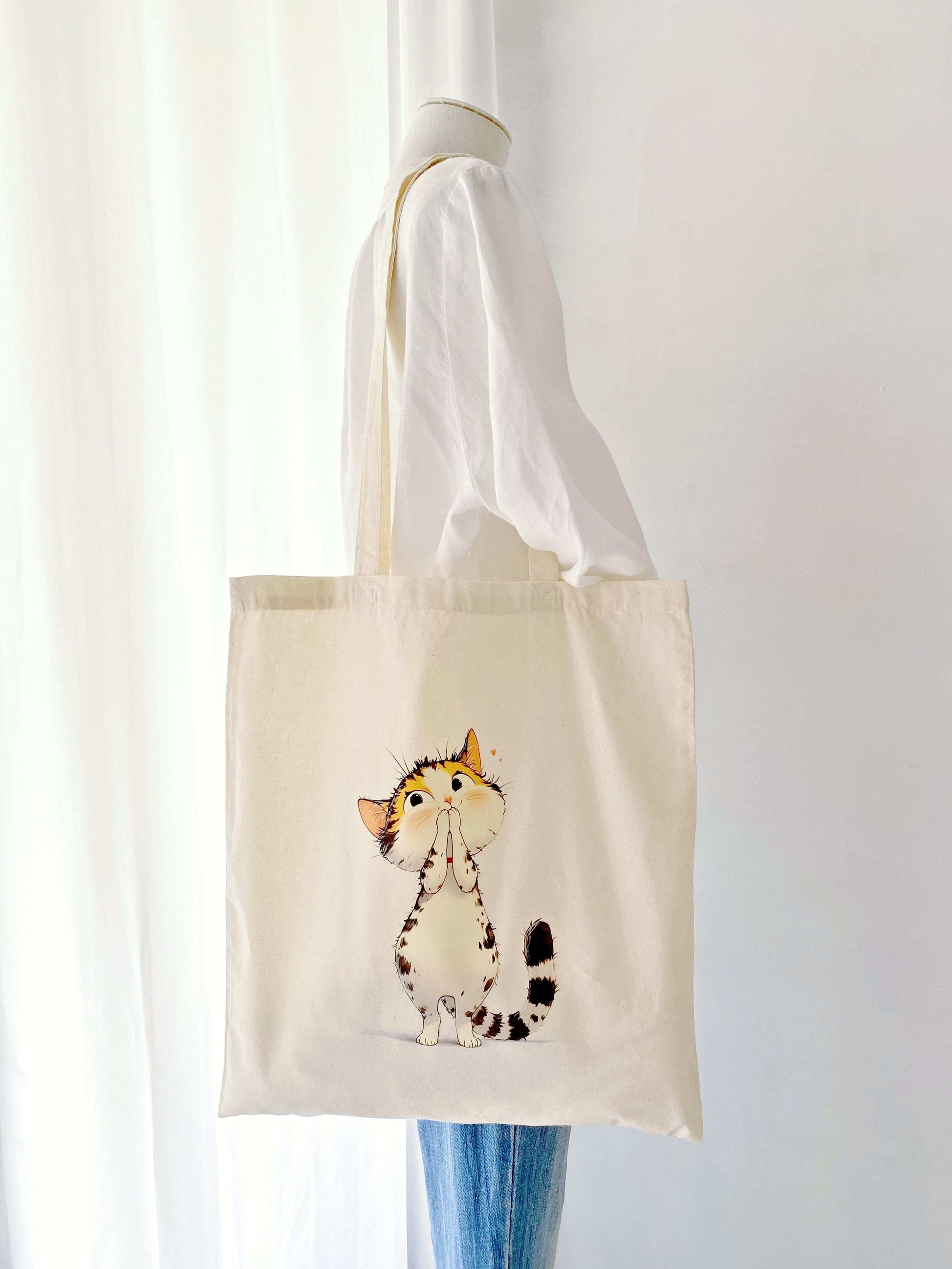 hand-dyed cat illustration on cotton bag