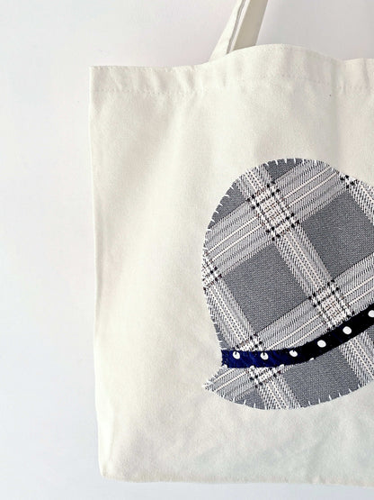 Stylish tote bag with hand-stitched patchwork crafted from natural materials