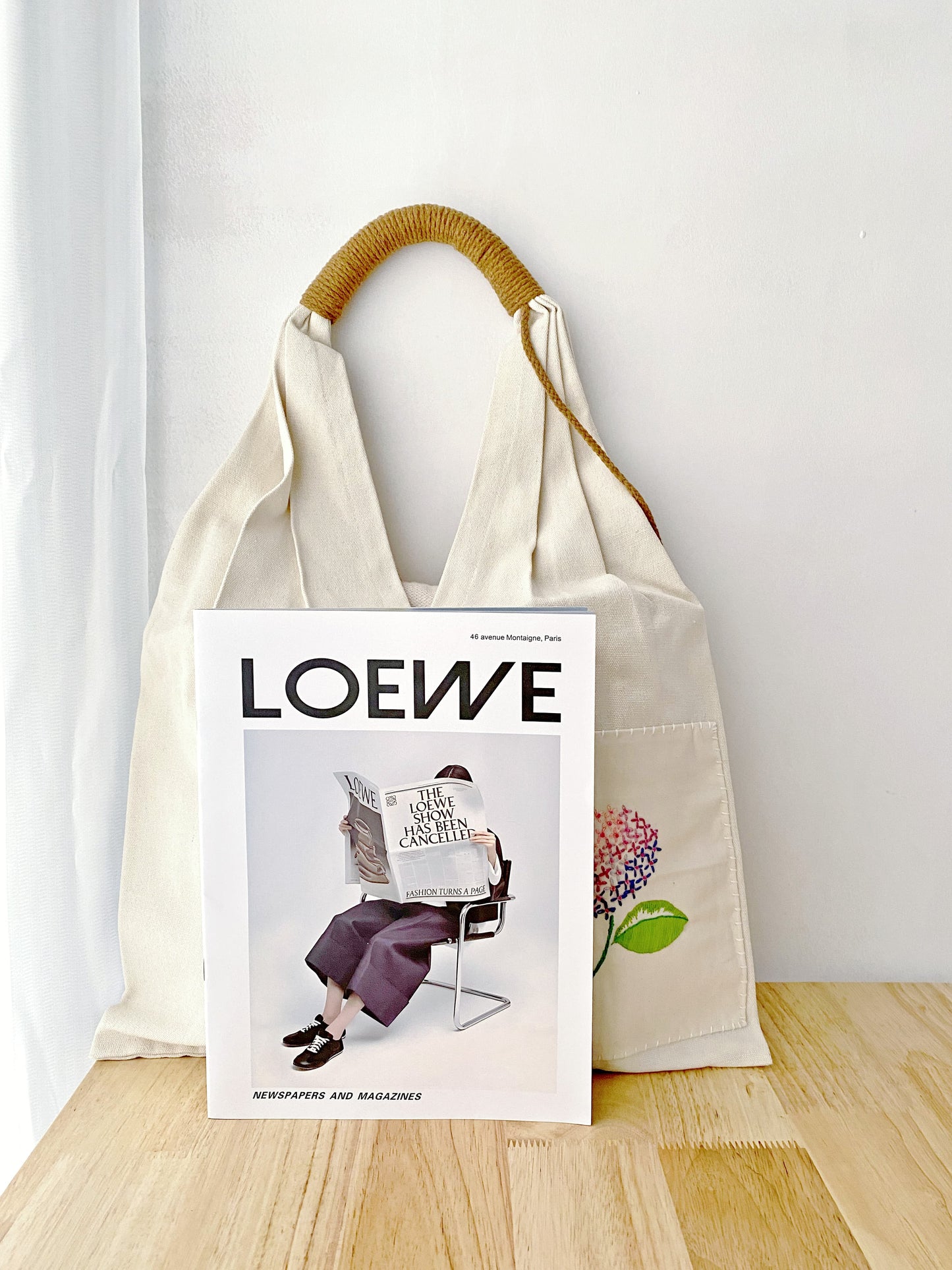 eco-friendly canvas shoulder bag with hand embroidered floral pattern