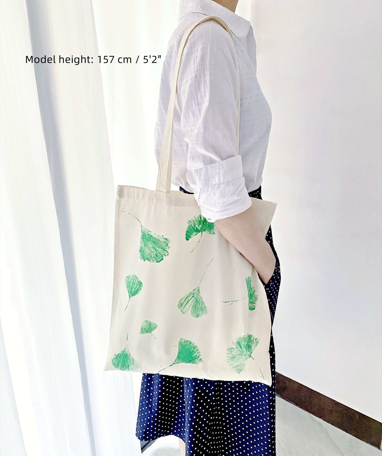 casual shoulder bag with botanical leaf design