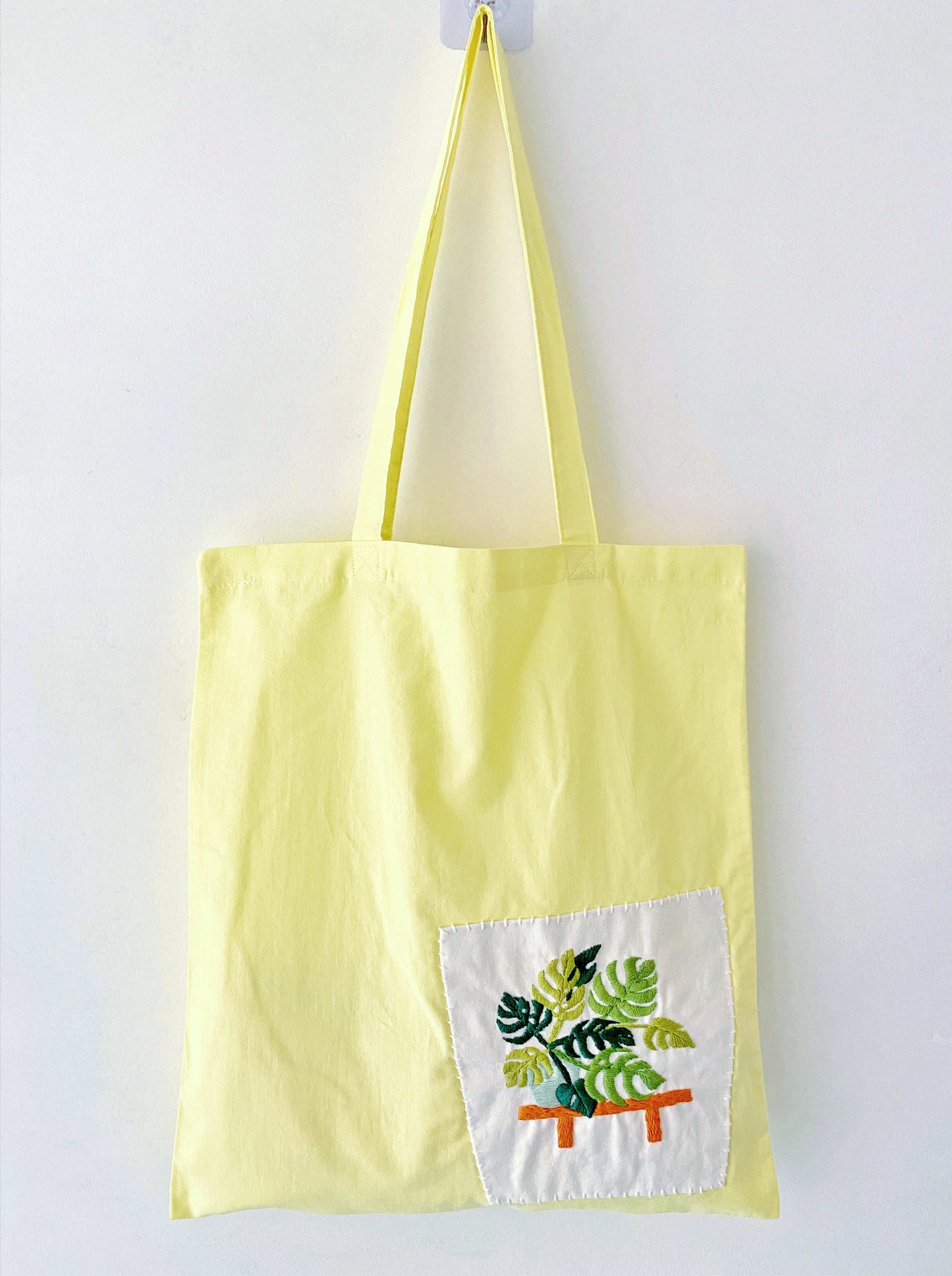 artistic embroidered tote bag ideal for plant lovers and design enthusiasts