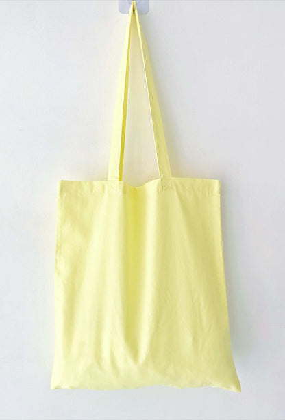 relaxed fit eco tote bag with unique handmade potted plant embroidery