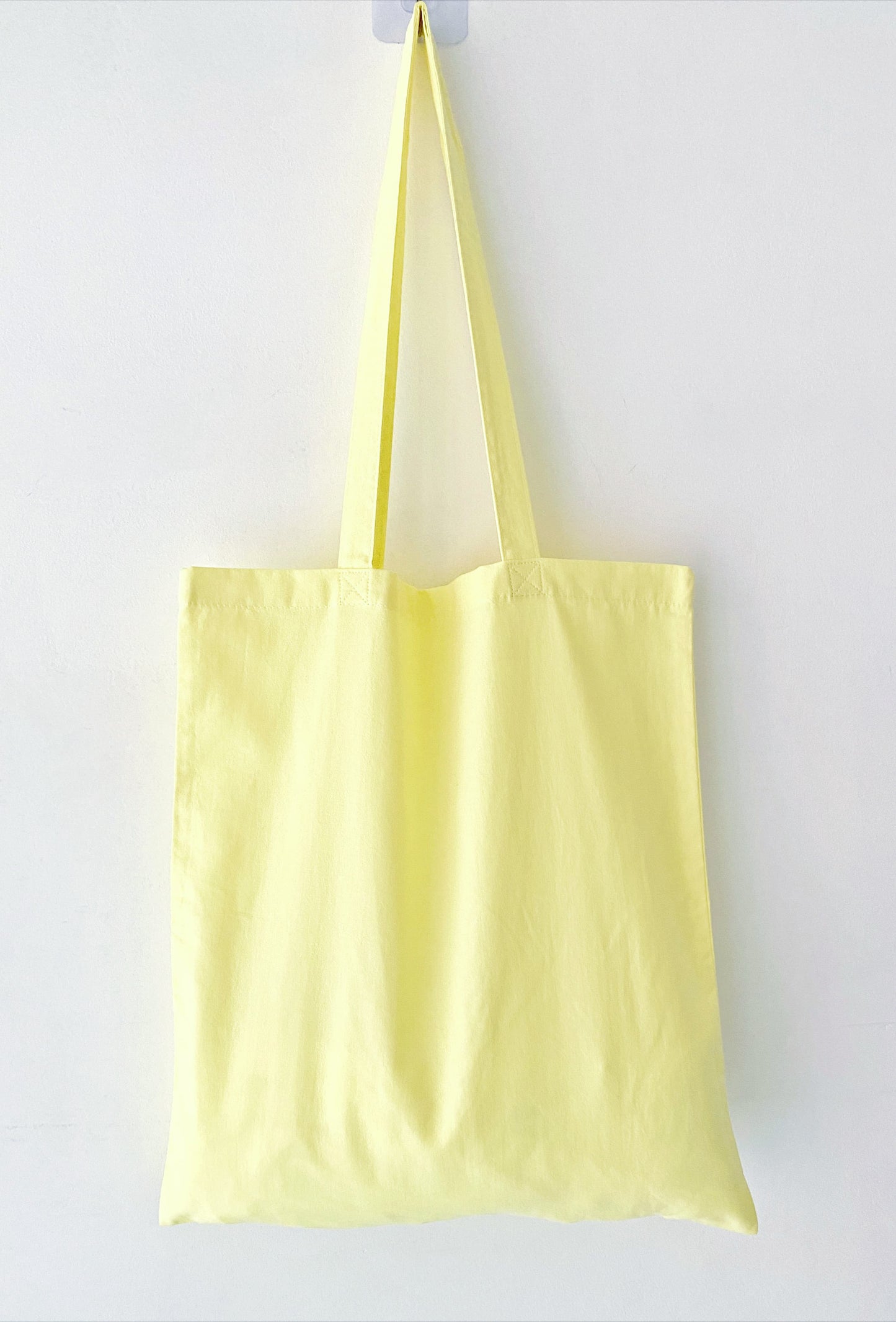 relaxed fit eco tote bag with unique handmade potted plant embroidery