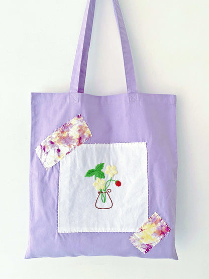 lightweight cotton tote with hand stitched flowers for spring outfit