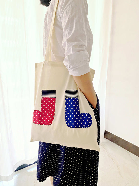 Eco-friendly canvas tote bag with unique hand-stitched patchwork