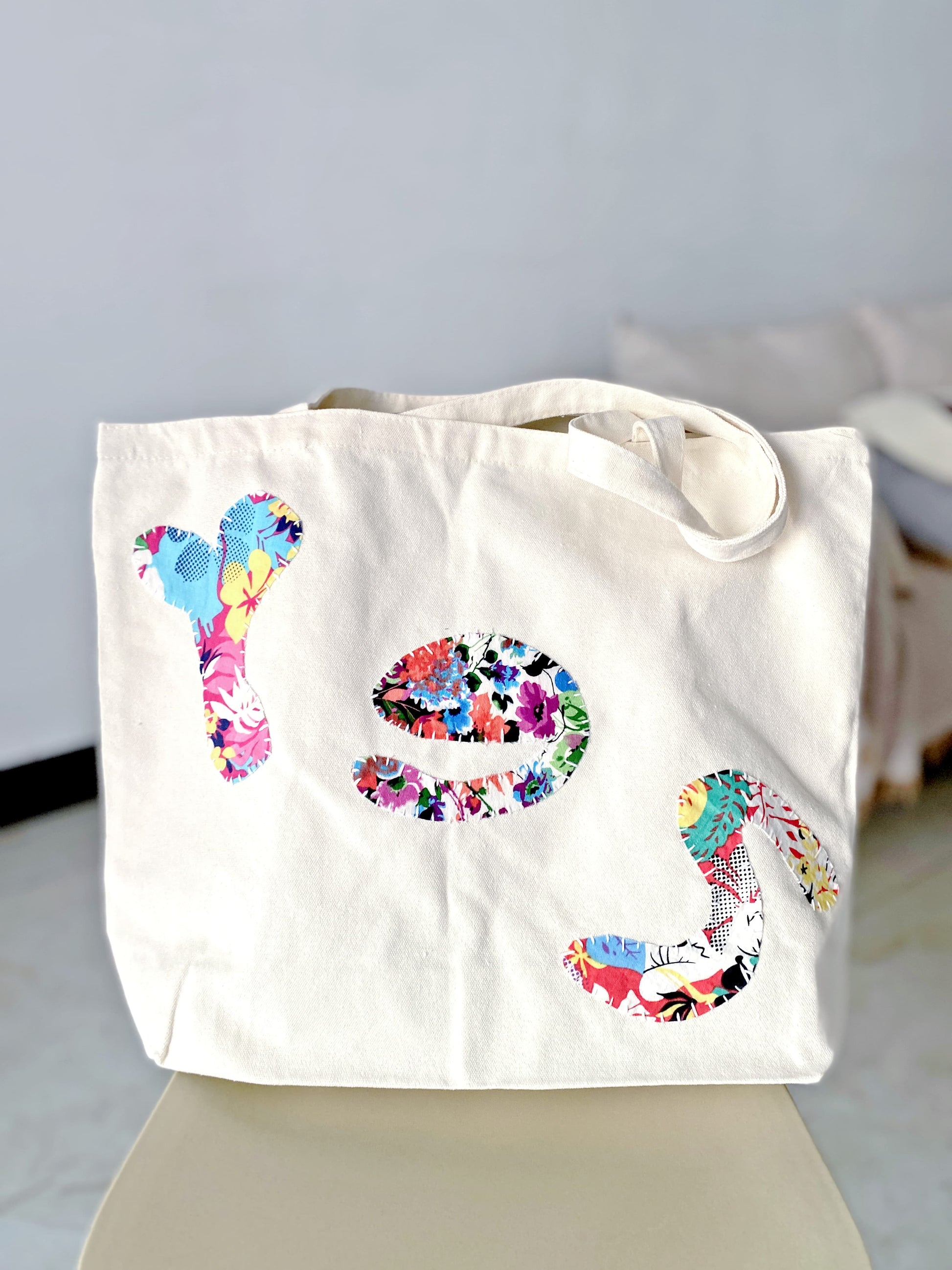 sustainable fabric tote bag for college students with artistic patchwork detail