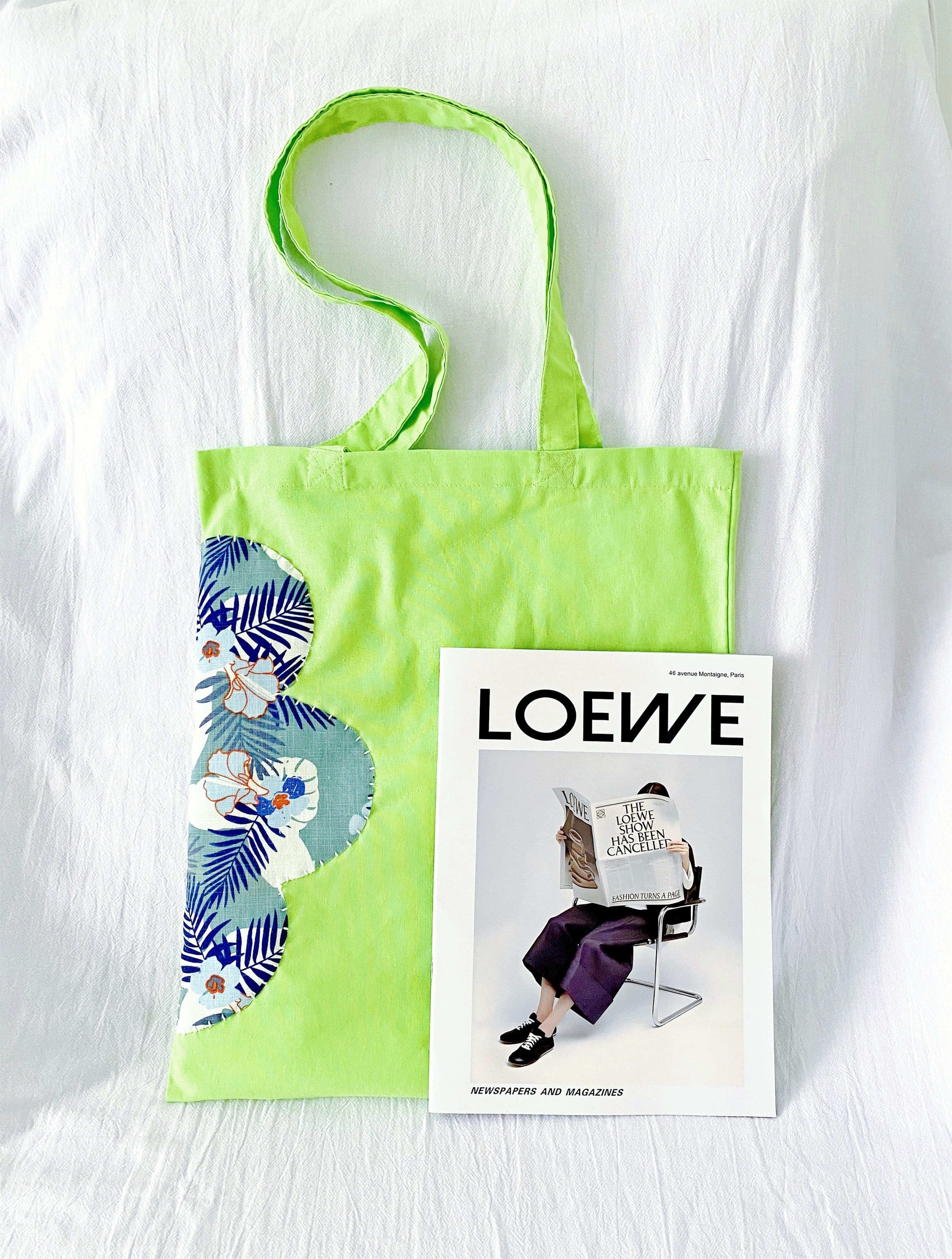 Spacious eco tote with durable construction and handcrafted patchwork for a minimalist look