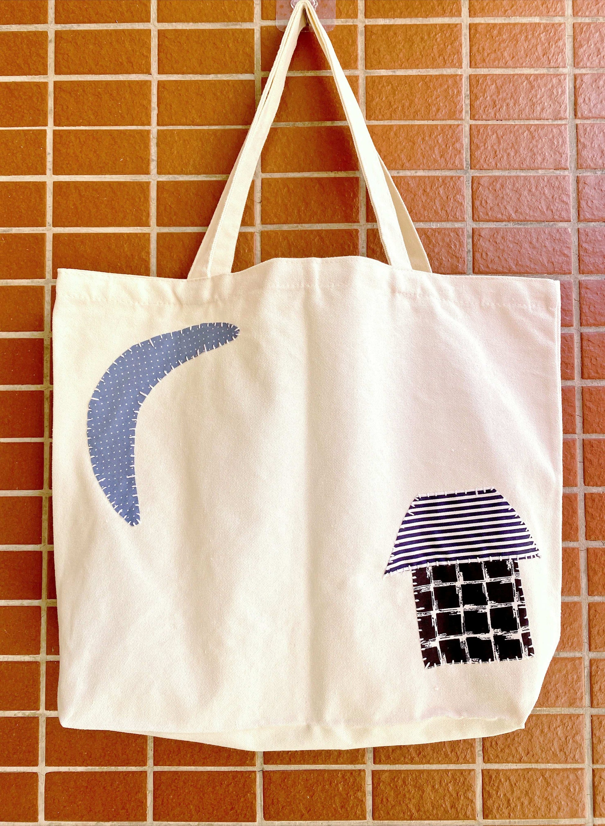 Women’s eco canvas tote with artisanal stitched patchwork details