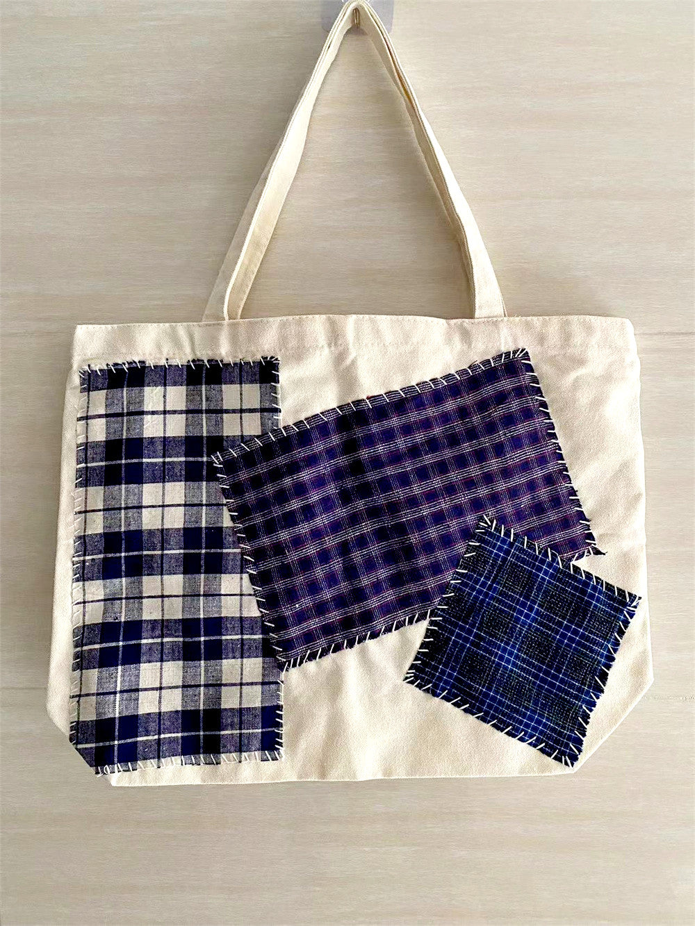 Large Capacity Handcrafted Canvas Tote Bag with Stitched Fabric Panels