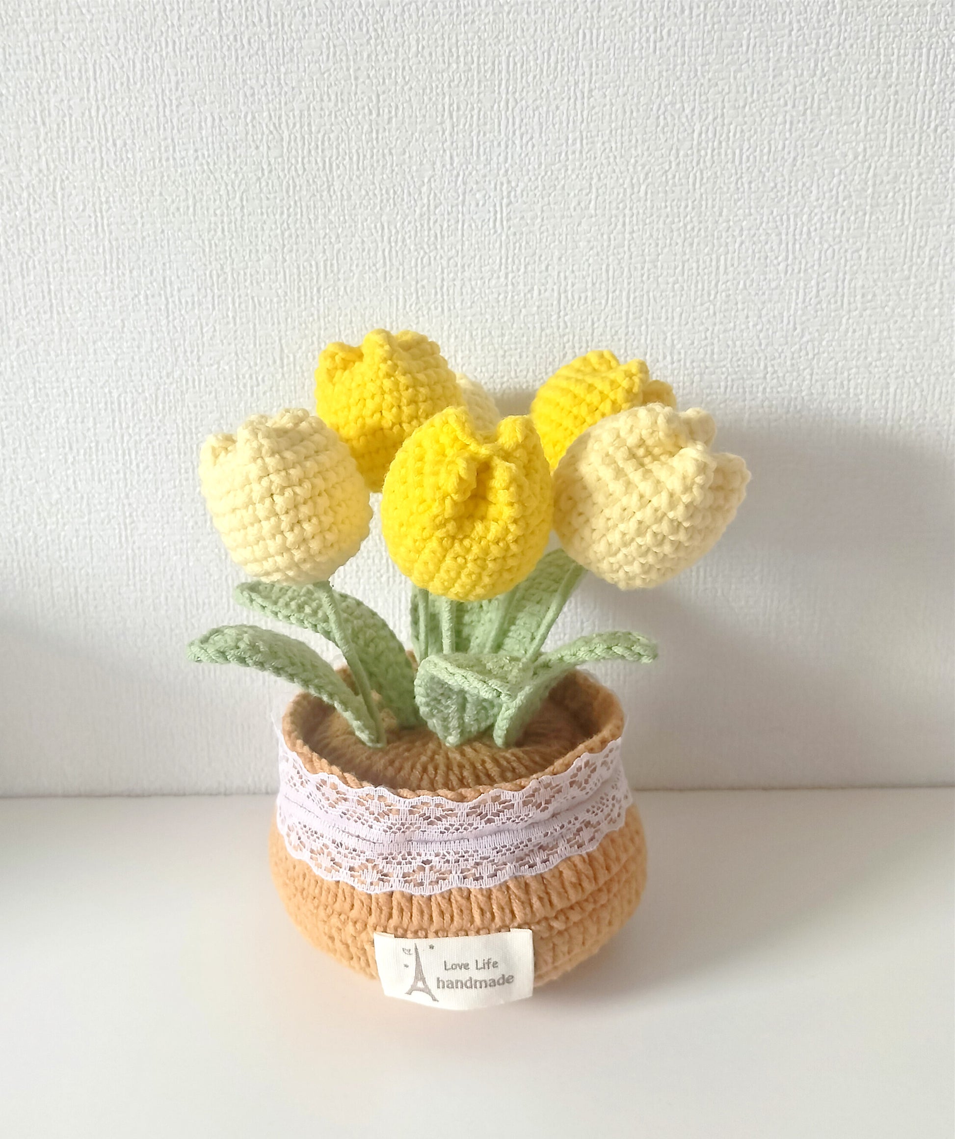 Handwoven tulip plant holders for tabletop display