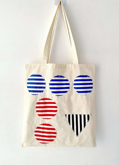 Hand-stitched canvas tote embracing minimalism and eco-friendliness