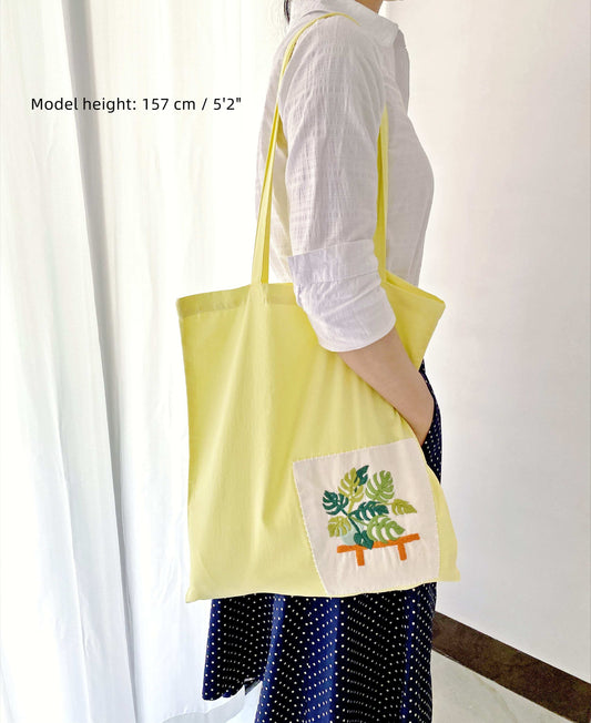 elegant minimalist cotton bag with unique floral embroidery for casual wear