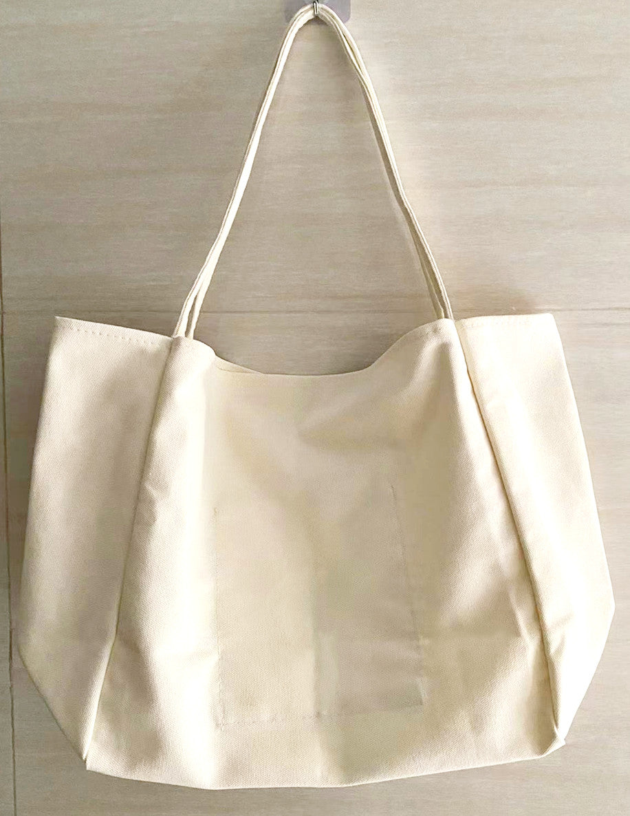 Handcrafted Canvas Tote Bag with Sturdy Design and Unique Patchwork