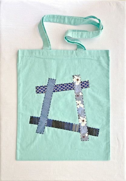 lightweight cotton tote bag with hand stitched patchwork design