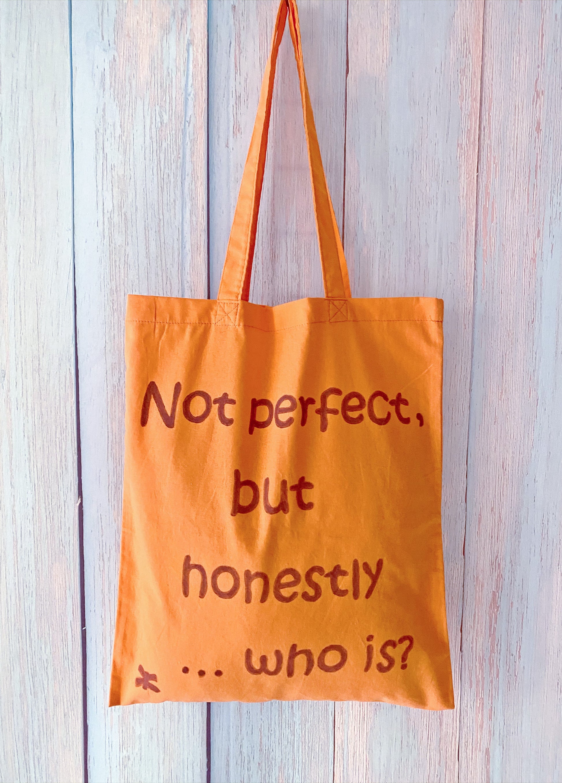 lightweight orange tote commonly chosen for its calm text detail