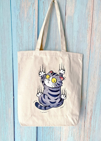 Durable cotton canvas tote with handmade cat print, ideal for conscious shoppers in Europe