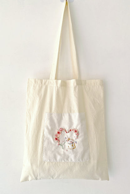 Bolso de mano con bordado de rosas naturales